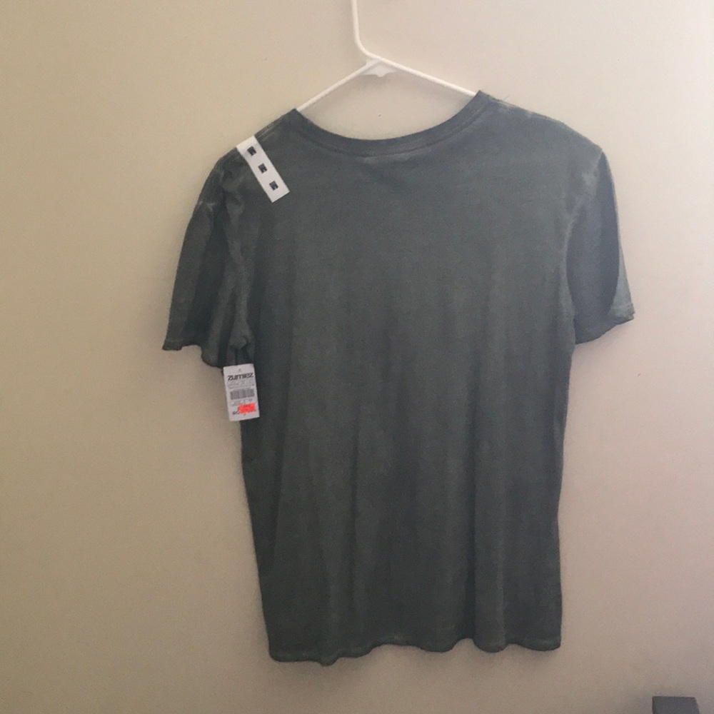 I am selling a Zumiez zine shirt